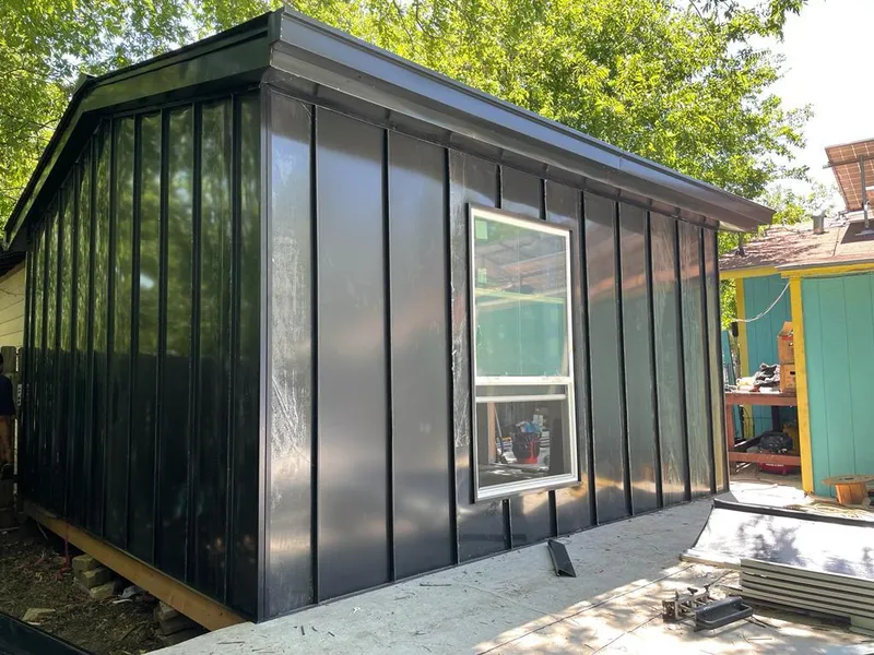 Black standing seam metal wall panels for Roof Inspection in Hawaiian Paradise Park